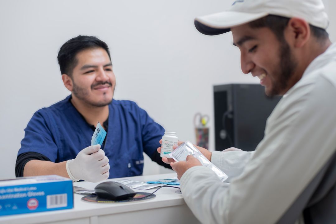 Health care workers at a pilot health facility in La Paz, Bolivia, validate PrEP application procedures.