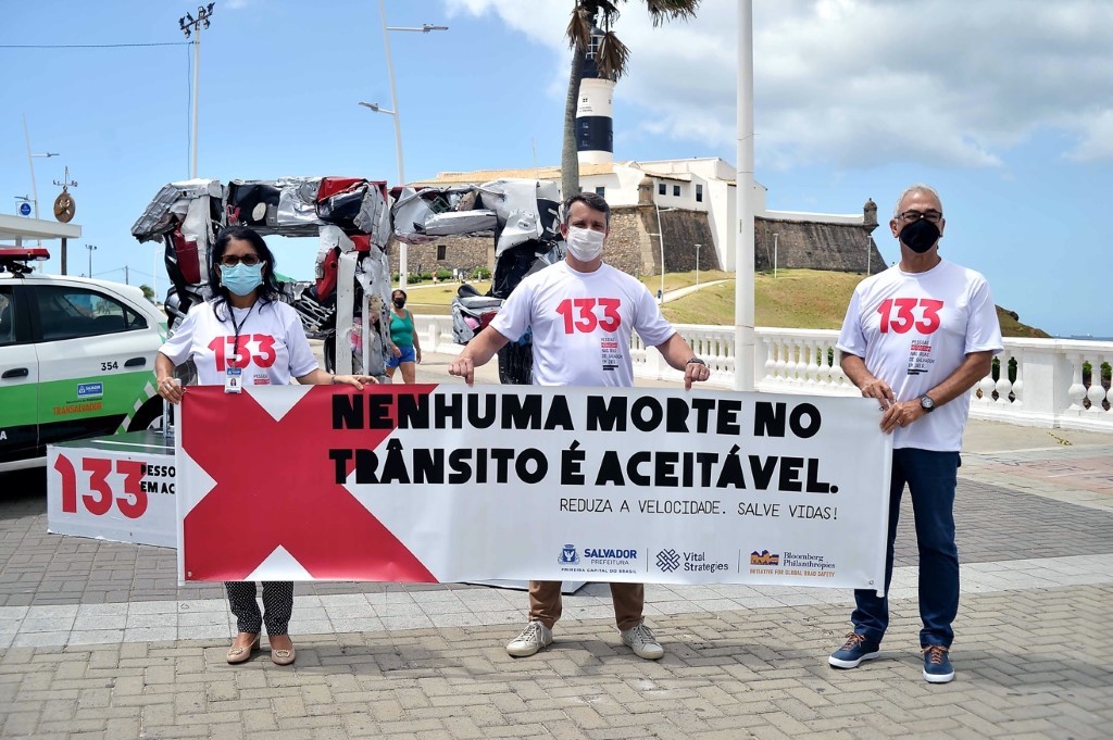 A group of people holding a sign

Description automatically generated with medium confidence